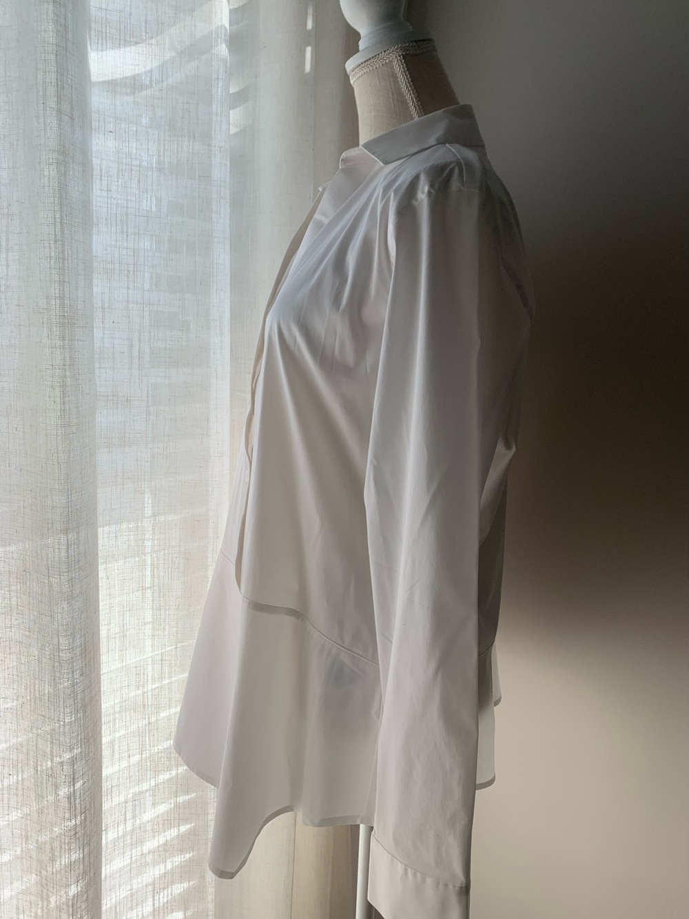 Classic White Button-Front Peplum Blouse with Asymmetrical Design - Picture 4 of 7